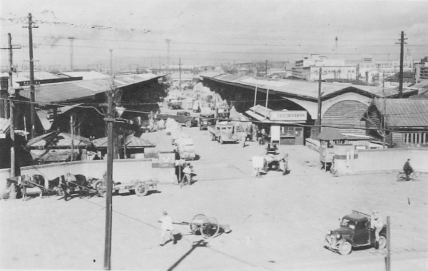 A city street in Osaka Japan in the 1950's.